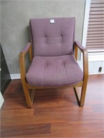 An Upholstered Armchair With Solid Oak Frame