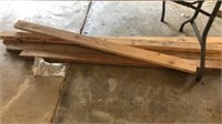 2”x4” and pile of lumber in middle of garage