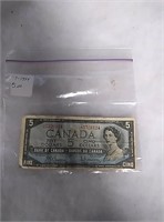 - 1 1954 Canadian. 5 dollar bill
