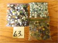 (3) Bags Of Marbles