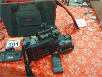 Canon camcorder with charger, power adapter,
