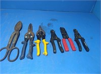 Flat of tin snips and wire strippers