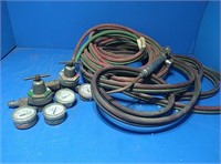 Set of Torch hoses with gauges and torch head.