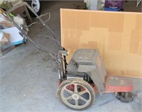 Troy Built trimmer mower.See us for manual.