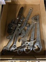 assorted wrenches pipe wrench crescent wrench