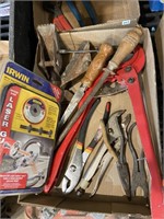 assorted tools and laser guide for saw