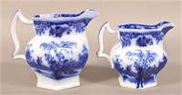 Two Flow Blue China "Scinde" Paneled Pitchers.