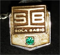 Sola Basic 10k gold service pin w emerald