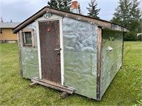 APPROX. 10X12 PORTABLE CABIN ON WOOD SKIDS,