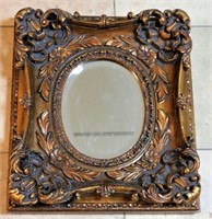 Ornate Gilt Cast Composition Frame Beveled Mirror.