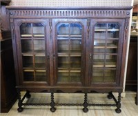 English Jacobean Revival Oak Bookcase.