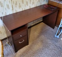 Brown computer desk. 60 in x 23 in x 30 in