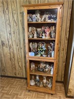 Cabinet with glass door and collectables