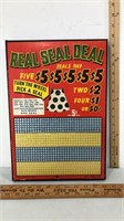 Vintage real seal deal punch board with spinning