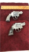 Pair of metal cap gun revolvers.  One is a hubley