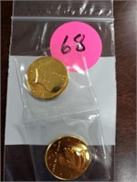 TWO GOLD PLATED HALF DOLLARS