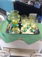 Yellow and green pitcher  with glasses
