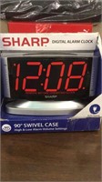 Sharp digital alarm clock
