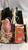 Seed starter trays, rope, scoops, for sale sign