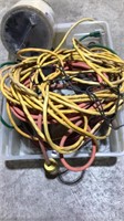 Tote of electrical wire and cords, grinder