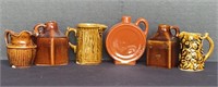 Six Unmarked Miniature Stoneware Jugs