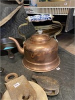 brass and porcelain tea kettle