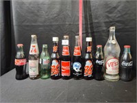 Group of Coca Cola Bottles and more