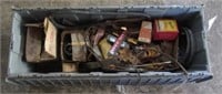 Tub full of antique automotive parts including