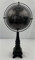 Metal globe with a wooden base