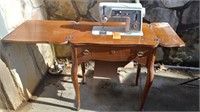 Singer Touch & Sew sewing machine in cabinet
