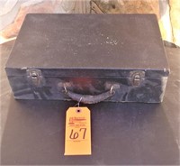 Vintage suitcase with assorted fabric