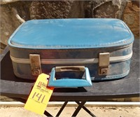 Small blue vintage suitcase