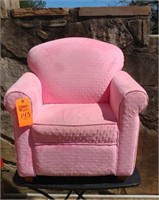 Child's plush pink chair