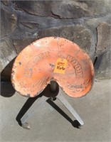 Walter A Wood tractor seat stool with wheels