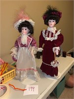 BEAUTIFUL PORCELAIN DOLLS ON STAND