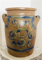 2 handle crock with highly decorated blue and