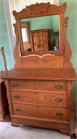 Antique oak dresser with a tilt top mirror,