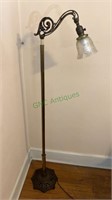 Victorian brass floor lamp with a flared glass