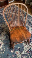 Antique hoop back rocking chair with a saddle