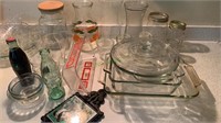 Kitchen lot that includes glass vases, Anchor