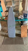 Two folding ironing boards, two electric irons,