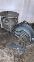 Two vintage metal floor fans - one on caster
