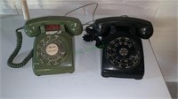 2 vintage rotary telephones - one in black and one