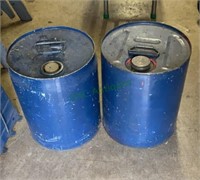 Lot of two 5 gallon gas/oil cans - contents