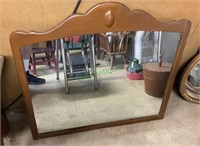 Wood framed wall mirror measures 34 x 33