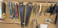 Lot includes miter saw, hacksaws, pipe wrench,