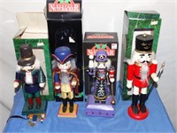 4 Wood Nutcrackers w/orig. boxes tallest is 14"