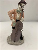 Vintage circus clown playing cello great condition