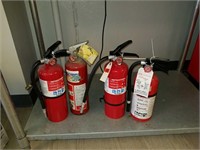 4 USED FIRE EXTINGUISHER