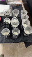 Wrought iron and glass candle holders